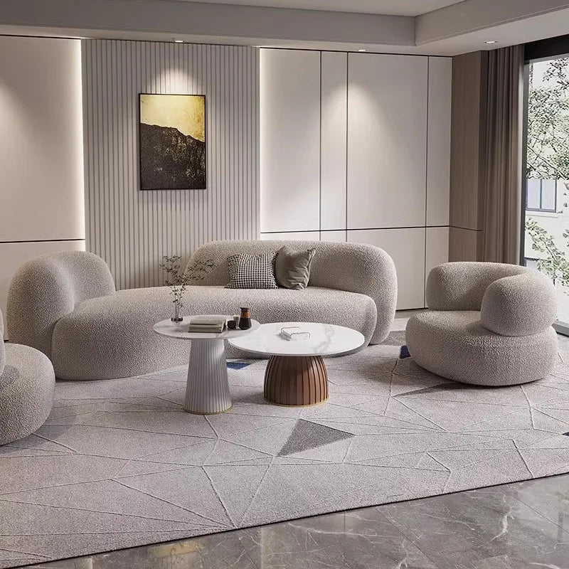 Luxury lambskin fabric curved sofa and coffee table modern minimalist living room, beauty salon, and clothing store furniture